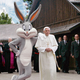 The pope joins a Six Flags ambassador on a tour of the grounds.